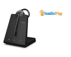 Jabra wireless headset in its ear-hook wearing style, docked on the charging base